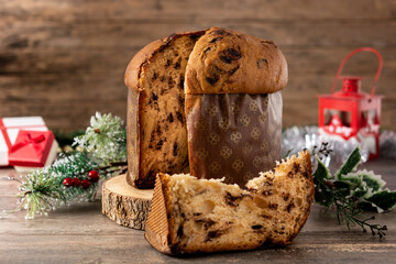 Traditional Italian panettone for Christmas on wooden table	