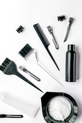 hairdresser woorking desk with tools on white background top view