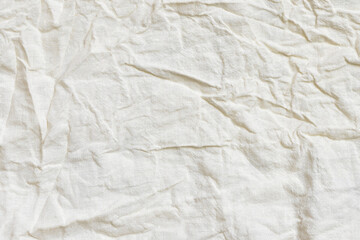 Beige burlap or matting background. Crumpled fabric texture. Design element