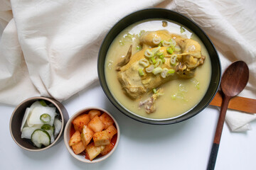 steaming samgyetang, chicken soup with ginseng korean food.
