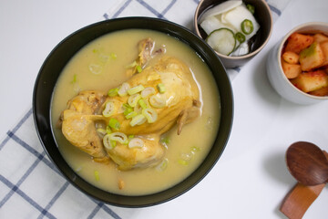 steaming samgyetang, chicken soup with ginseng korean food.