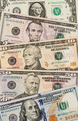 Money US dollars banknotes, a lot of different money. Bitcoin exchange for dollar inflation. Worldwide cryptocurrency and digital payment system. Availability