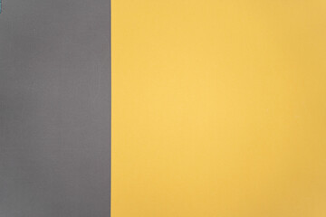 Yellow and gray paper background texture. Colour of the year