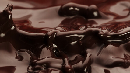 Macro photo of premium dark chocolate splashing.