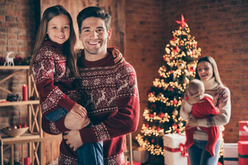 Photo of young family parents kid winter noel december mommydaddy xmas spirit together new year indoors