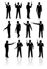 Fototapeta Isolated vector silhouettes of James Bond inspired spies or hitmen wearing a suit and tie. All characters are aiming or posing with pistols or rifles. obraz
