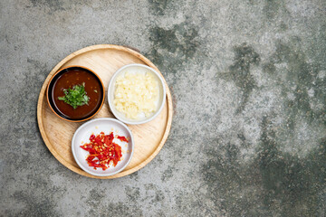 Sukiyaki sauce with chili and garlic in bowl for dipping sukiyaki