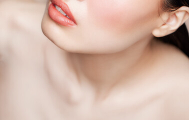 Collar bone pink lips and skin care on nude beauty makeup background