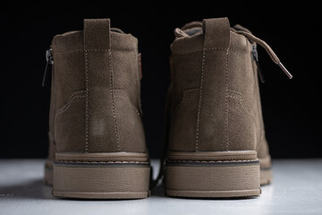 Men's fashionable brown autumn leather boots.