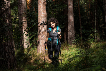 Obraz premium girl walking in the woods