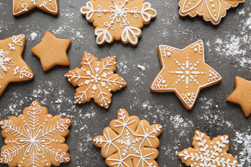 Tasty Christmas cookies on grey table, flat lay