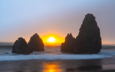 Rodeo Beach in San Francisco, sunrise on the beach, rocks, sand, waves and sun, vivid colors