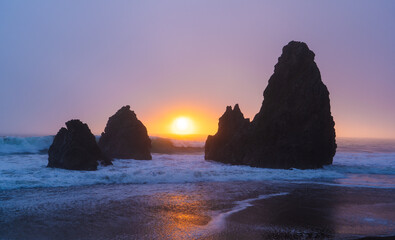 Rodeo Beach in San Francisco, sunrise on the beach, rocks, sand, waves and sun, vivid colors