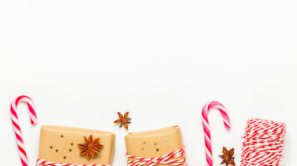 Christmas and New Year border frame  with presents. Frame with gift boxes and candy cane, copy space