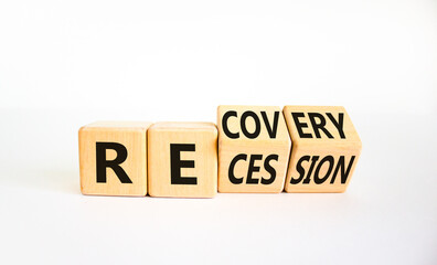 Recovery and recession symbol. Turned cubes and changed the word 'recession' to 'recovery'....