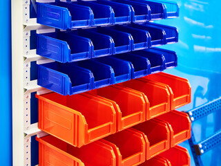 Fototapeta premium Colorful plastic containers in the store