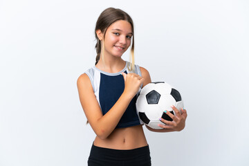 Little caucasian girl playing football isolated on white background proud and self-satisfied