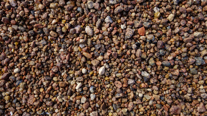 Gravel on the coast, textured abstract background for design