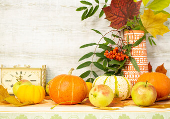 Thanksgiving day with fruits and vegetables on the table. Autumn harvest at a time of abundance.