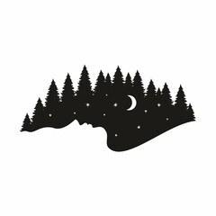 Silhouette of a girl's face against the background of a night forest