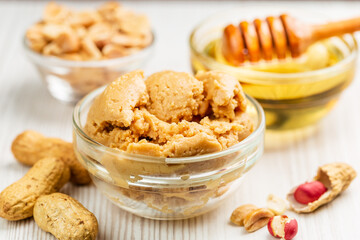 Close up of Peanut butter in a bowl with honey