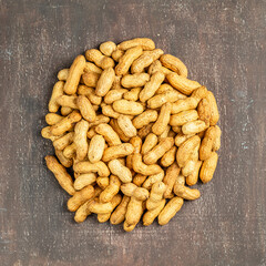 Heap of the peanuts with the shell top view