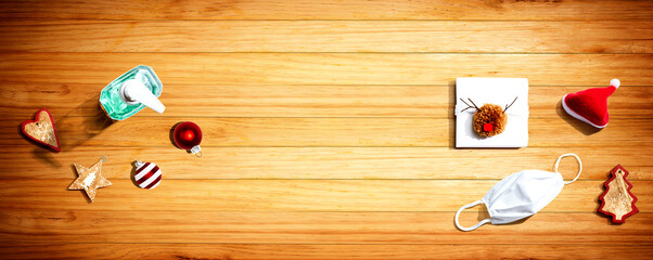 Christmas ornaments with a mask and a sanitizer bottle from above