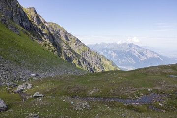 Amazing hiking day in one of the most beautiful area in Switzerland called Pizol in the canton of Saint Gallen. What a wonderful landscape in Switzerland at a sunny day.