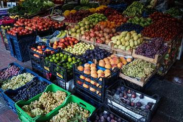 Sale of fresh fruits and vegetables at the market.             
