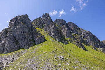 Amazing hiking day in one of the most beautiful area in Switzerland called Pizol in the canton of Saint Gallen. What a wonderful landscape in Switzerland at a sunny day.