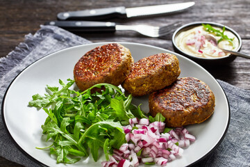 vegan lentil patties with rocket onion salad