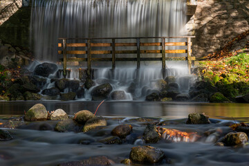 Fototapeta premium City Smiltene, Latvia. The waterfall flows into the Abula River, which flows through the Old Park.