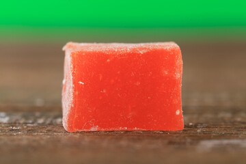 Arabic traditional sweets and berry with tea on plate