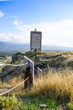 Vertical shot of a clock tower in Comarca Matarrania, Teruel province, Spain