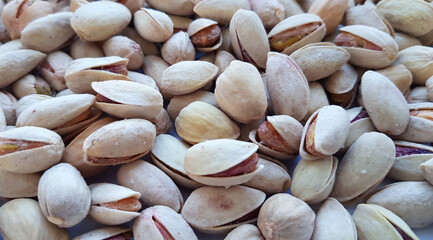 Pistachios texture and background . Tasty pistachios as background,as pistachios texture. flat lay