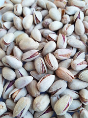 Pistachios texture and background . Tasty pistachios as background,as pistachios texture. flat lay