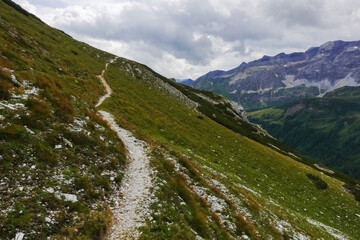 Fototapeta na wymiar steep small hiking path on a mountain in austria