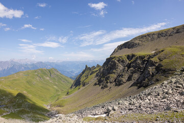 Fototapeta premium Amazing hiking day in one of the most beautiful area in Switzerland called Pizol in the canton of Saint Gallen. What a wonderful landscape in Switzerland at a sunny day.