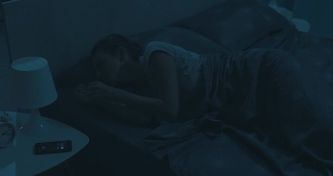 Woman receiving a phone call late at night