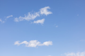 Amazing clouds hanging in the blue sky. Wonderful sunset and a better sunrise with beautiful clouds with a colourful sky.