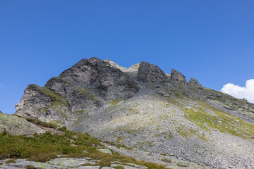 Amazing hiking day in one of the most beautiful area in Switzerland called Pizol in the canton of Saint Gallen. What a wonderful landscape in Switzerland at a sunny day.