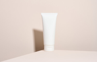 empty white plastic tubes for cosmetics. Packaging for cream, gel, serum, advertising and product...