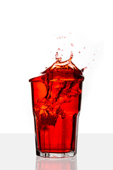 Red drink splashed on isolated on white background.