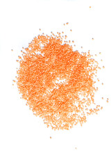 Small orange balls on a white background. Round bath salt. Isolate.