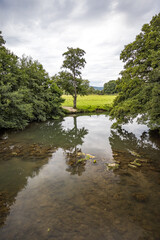 Fototapeta na wymiar Reflections on the River Teme, Leinwardine, Herefordshire, England