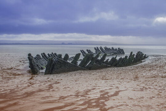 The remains of the wreck of  on Berrow Beach on the coast