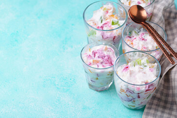 Multicolored dessert with fruit jelly