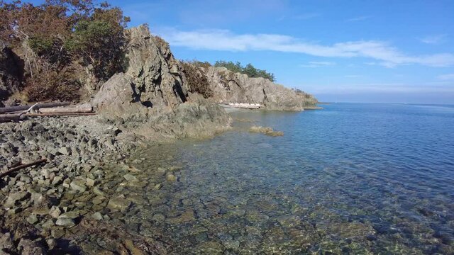 Calm clear ocean on Vancouver Island. Pipers Lagoon Park near Nanaimo, British Columbia, Canada. 