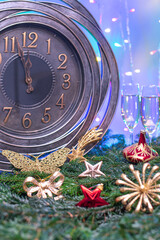 Two minutes till midnight .Large clock counting last moments before Christmass or New Year