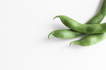 Green bean pods, located on the right. Space for text.